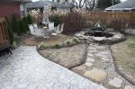 Stamped patio, pond, and brick patio