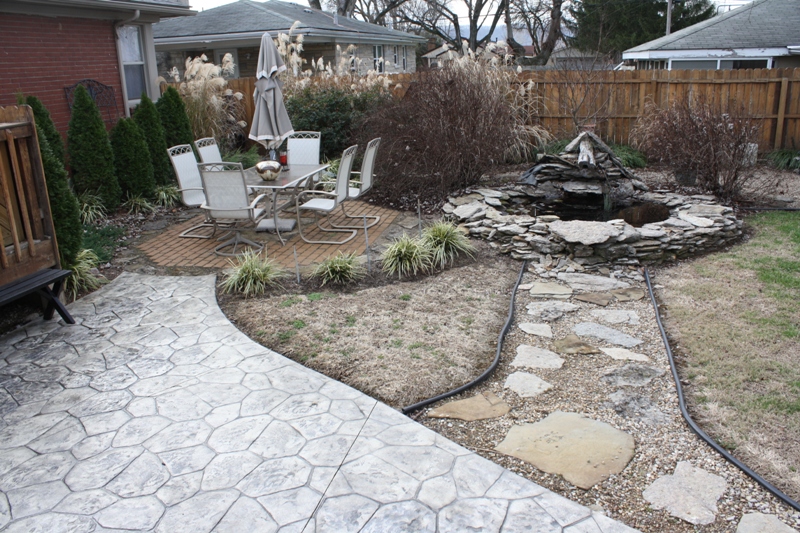 Stamped patio, pond, and brick patio